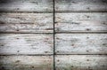 Old wooden door background with cracked paint and rusty nails Royalty Free Stock Photo