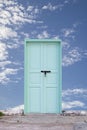 old wooden door with blue sky background. Royalty Free Stock Photo