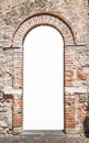 Old wooden door with brick archway. Royalty Free Stock Photo