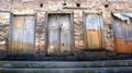 Old wooden door on a brick house. Royalty Free Stock Photo