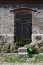 Old shutter door brick wall Royalty Free Stock Photo