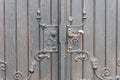 Old wooden door with cast iron handle Royalty Free Stock Photo