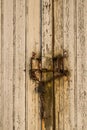 Old wooden door with chain and lock