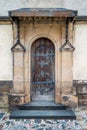 The old wooden door of the church. Rear entrance. Royalty Free Stock Photo