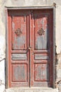 An old wooden door closed on a padlock Royalty Free Stock Photo