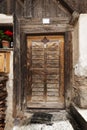 Old wooden door in D`ultimo