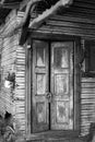 Old wooden door in a deteriorated building