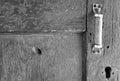 old wooden door. door handle and keyhole Royalty Free Stock Photo