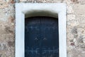 Wooden texture of old doors with forging elements Royalty Free Stock Photo