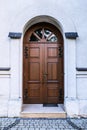 Old wooden door with glass in ancient building Royalty Free Stock Photo