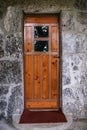 Old wooden door with glass in ancient building Royalty Free Stock Photo