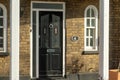 Old wooden door in Hertford, Hertfordshire