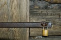 Old Wooden Door with Hinge and Padlock Royalty Free Stock Photo