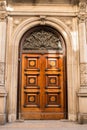 Old Wooden Door in Old House in Barcelona Royalty Free Stock Photo