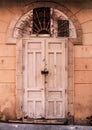 Old wooden door with iron details Royalty Free Stock Photo