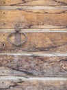 Old wooden door with iron handle and lock Royalty Free Stock Photo