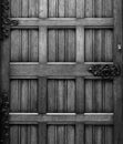 Old wooden door with an iron handle Royalty Free Stock Photo