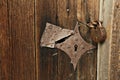 Old wooden door with iron lock Royalty Free Stock Photo