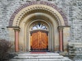 old wooden door with iron reinforcements Royalty Free Stock Photo