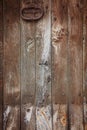 Old wooden door with knocker Royalty Free Stock Photo