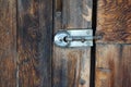 Old wooden door, latch and lock Royalty Free Stock Photo