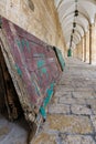 An old wooden door lies against a wall in a tunnel along the west wall on the Temple Mount, in the old city of Jerusalem, in
