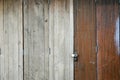 Old wooden door locked with padlock. Royalty Free Stock Photo
