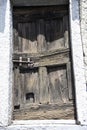 Old wooden door with metal door lock Royalty Free Stock Photo