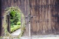 Old wooden door with metal fittings