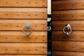 Old Wooden Door with Metal Knockers in Verona Royalty Free Stock Photo