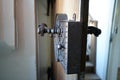 Old wooden door metal lock Royalty Free Stock Photo
