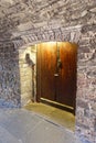 Old wooden door near the Royal Mile high street - Edinburgh, Scotland Royalty Free Stock Photo
