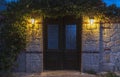 Old wooden door at night Royalty Free Stock Photo