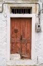 Old wooden door of an old house in Paxoi island, Greece