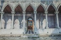 Old wooden door.In the old wall is made of cement.Entrance to th Royalty Free Stock Photo