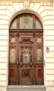 Old wooden door with ornaments Royalty Free Stock Photo