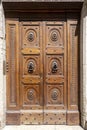 Old wooden door with ornaments Royalty Free Stock Photo