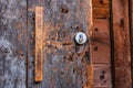 Old wooden door pattern background with a modern lock installed