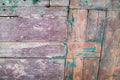 Old wooden door with peeling paint from planks Royalty Free Stock Photo