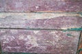 Old wooden door with peeling paint from planks Royalty Free Stock Photo