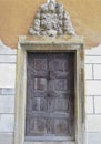 Old wooden door of the pilgrimage Church Maria Strassengel, a 14th century Gothic church in the town Judendorf Strassengel near Royalty Free Stock Photo