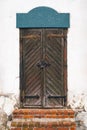 An old wooden door with a red bricks stairs Royalty Free Stock Photo