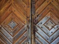 Old wooden door with rustic keyhole