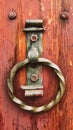 Old wooden door with rusty doorhandle. Ancient traditions Royalty Free Stock Photo