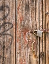 Old wooden door with rusty latch Royalty Free Stock Photo