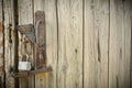 Old Wooden Door With A Rusty Steel Lock. Farm Gate From Planks With An Old Padlock. The Lock On The Door Of The Shed Royalty Free Stock Photo