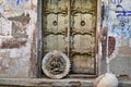 Old wooden door to aged ancient building symbol with image of Ganesha god Royalty Free Stock Photo