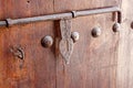 Old wooden door with vintage metal decoration latch. Arabian sty Royalty Free Stock Photo