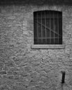 Old wooden door, window in rural barn, close up, balck and white, monochrome Royalty Free Stock Photo