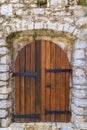 Old wooden door in the ancient Citadel fortress in Budva Old Town, in Montenegro, Balkans